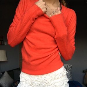 orange sweater
